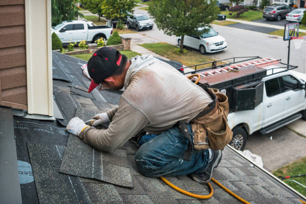 Professional Roofing technician working in Leland, IL